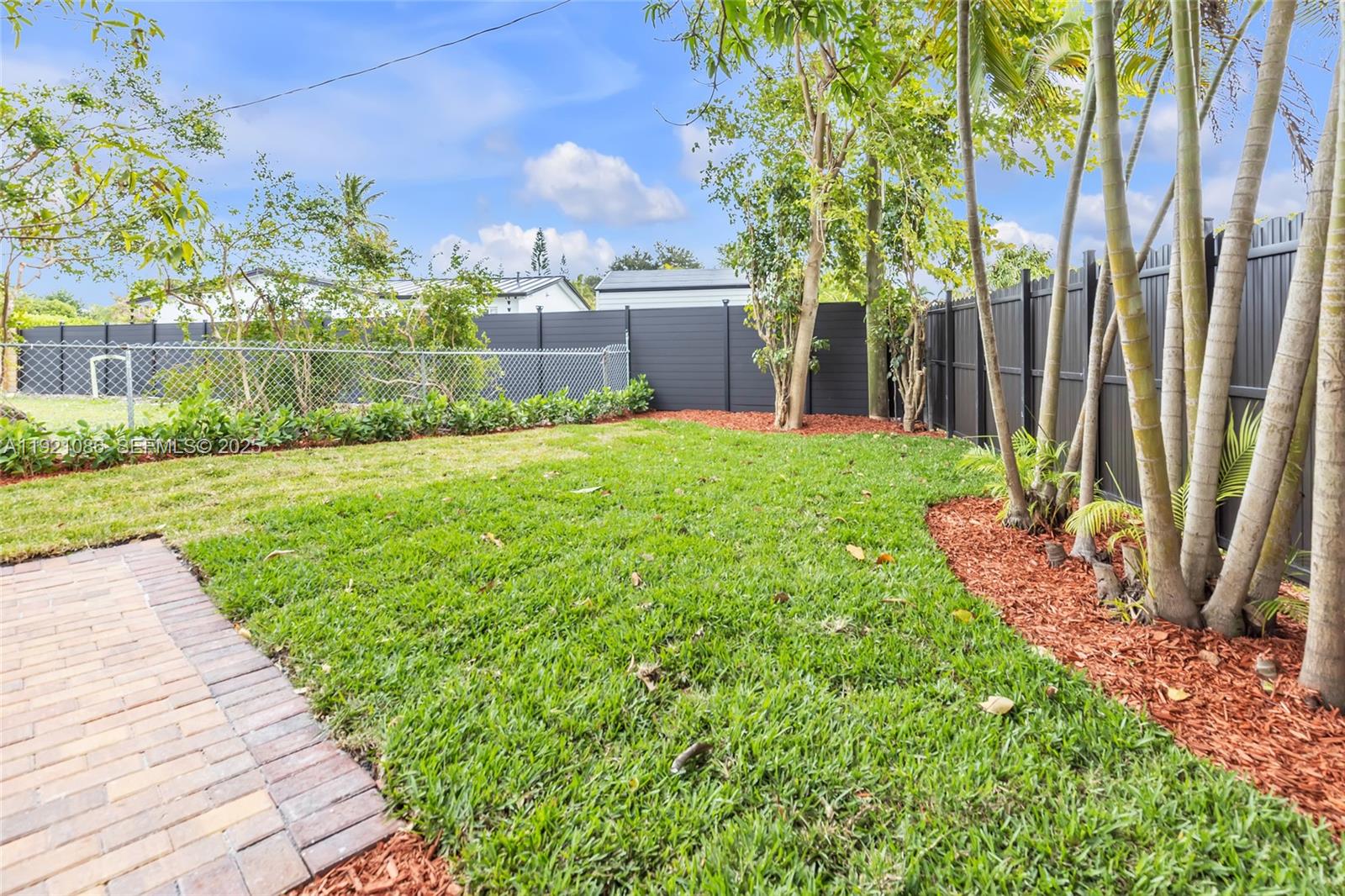 9400 Southwest 193rd Drive, Unit 9400 Cutler Bay, FL 33157 - Photo 40 of 42 a view of a back yard