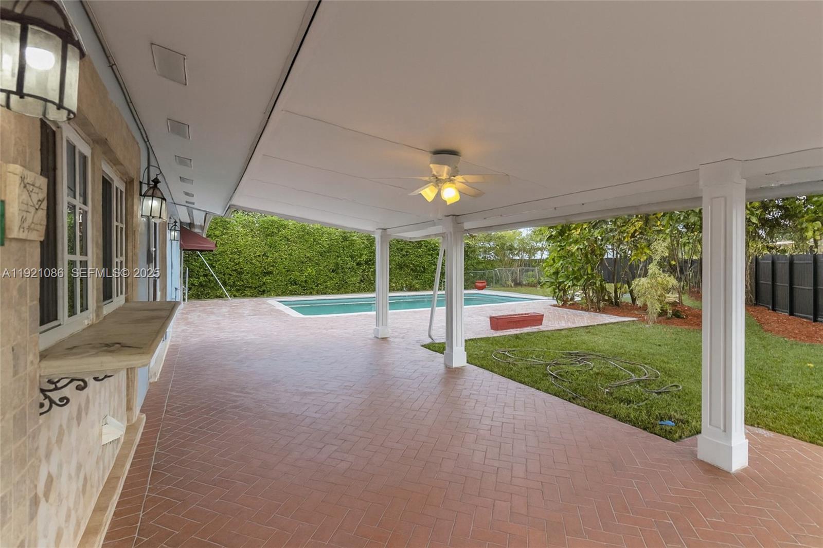 9400 Southwest 193rd Drive, Unit 9400 Cutler Bay, FL 33157 - Photo 42 of 42 a view of a porch and garden