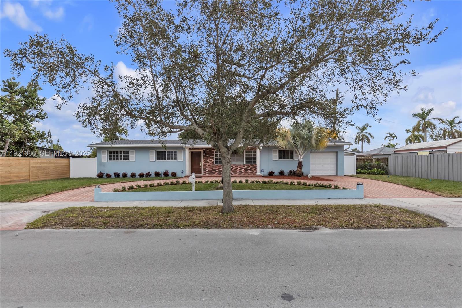 9400 Southwest 193rd Drive, Unit 9400 Cutler Bay, FL 33157 - Photo 6 of 42 a view of a house with a street