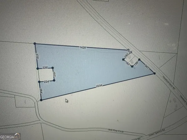 a view of a refrigerator in kitchen