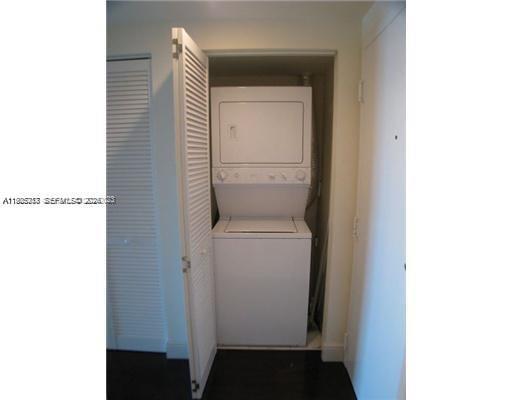 2740 Southwest 28th Terrace, Unit 503 Miami, FL 33133 - Photo 13 of 19 a utility room with dryer and washer