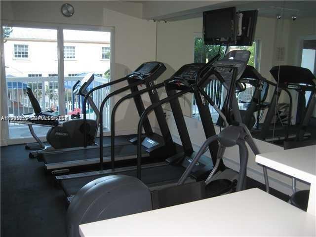2740 Southwest 28th Terrace, Unit 503 Miami, FL 33133 - Photo 18 of 19 a view of a room with gym equipment