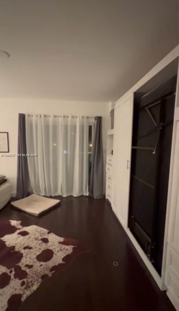 2740 Southwest 28th Terrace, Unit 503 Miami, FL 33133 - Photo 2 of 19 a view of wooden floor in a room