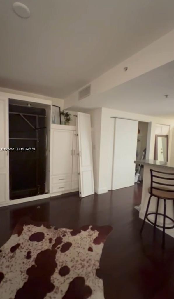 2740 Southwest 28th Terrace, Unit 503 Miami, FL 33133 - Photo 5 of 19 a bedroom with a bed and a window