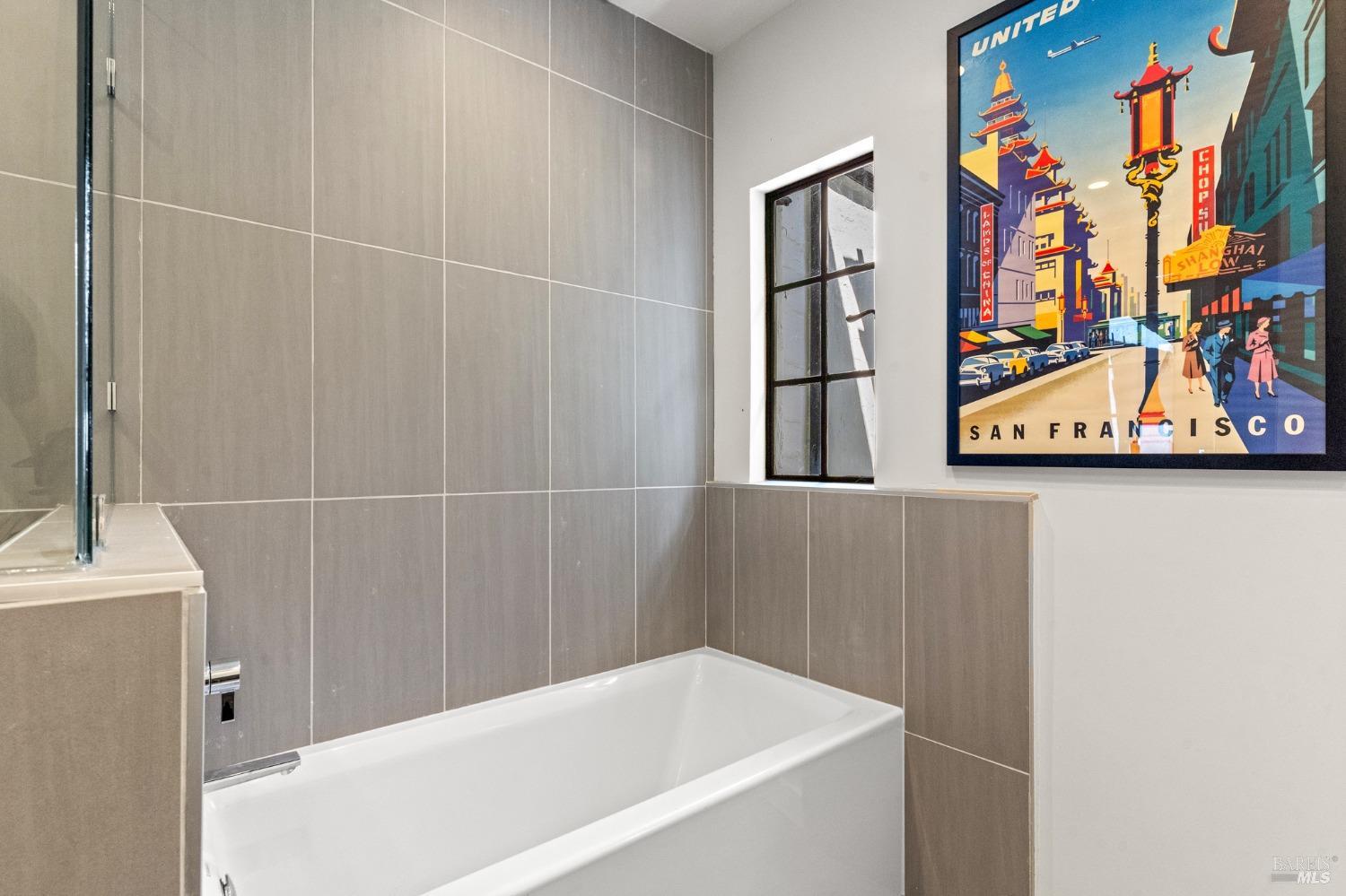 93 Cascade Drive Fairfax, CA 94930 - Photo 16 of 61 a bathroom with a bathtub and a shower