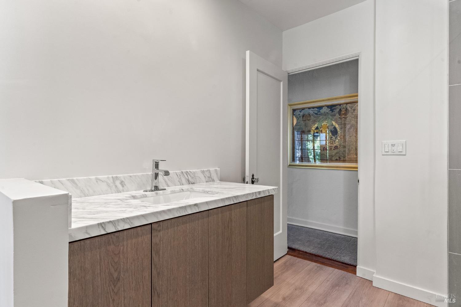 93 Cascade Drive Fairfax, CA 94930 - Photo 17 of 61 a bathroom with a sink vanity and mirror