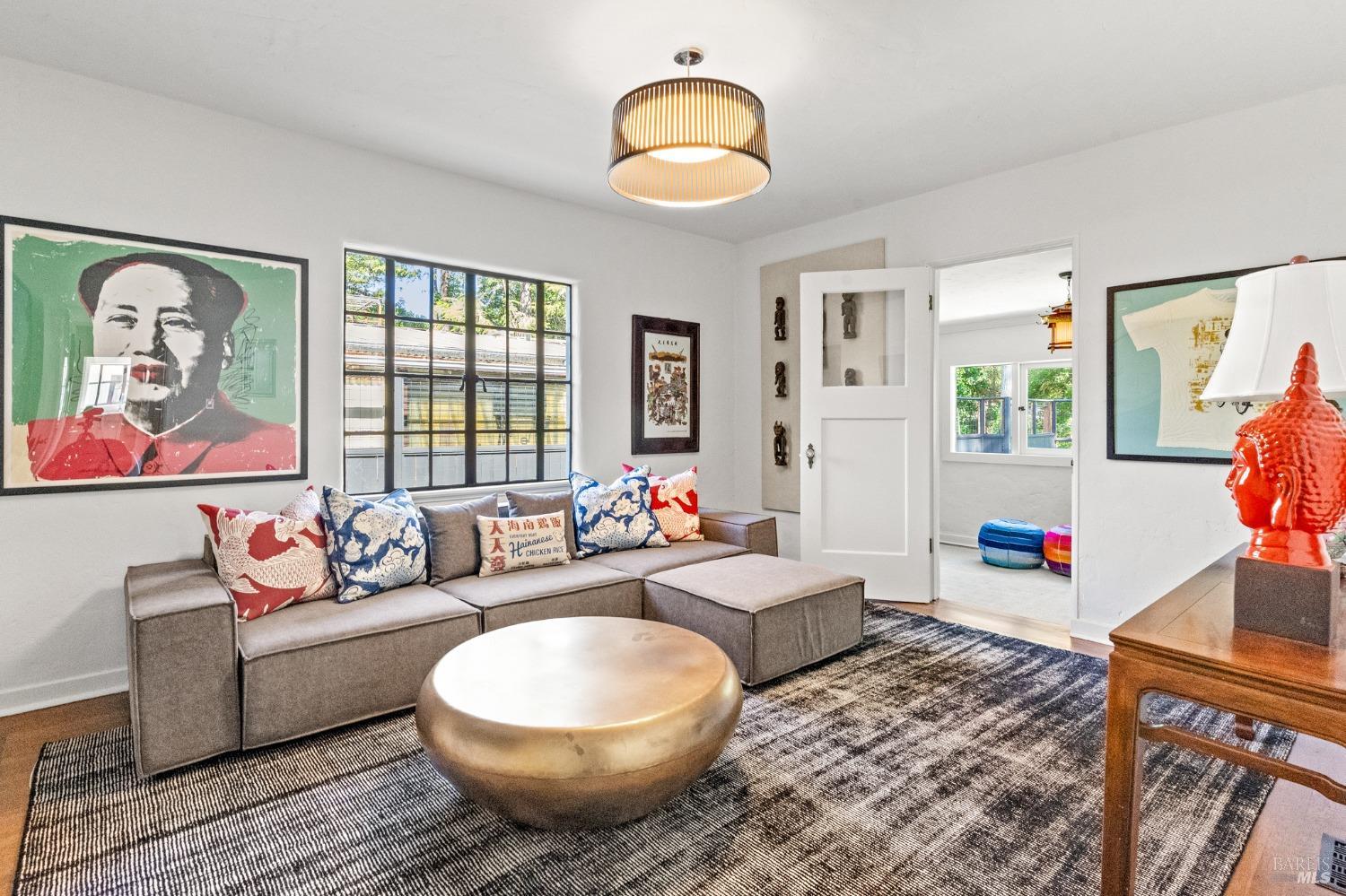 93 Cascade Drive Fairfax, CA 94930 - Photo 18 of 61 a living room with furniture and a window