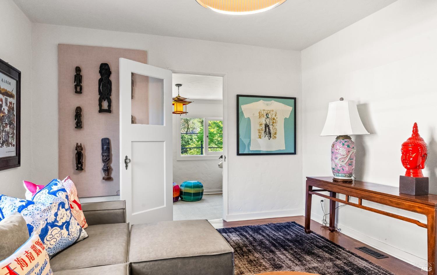 93 Cascade Drive Fairfax, CA 94930 - Photo 20 of 61 a living room with furniture and a window