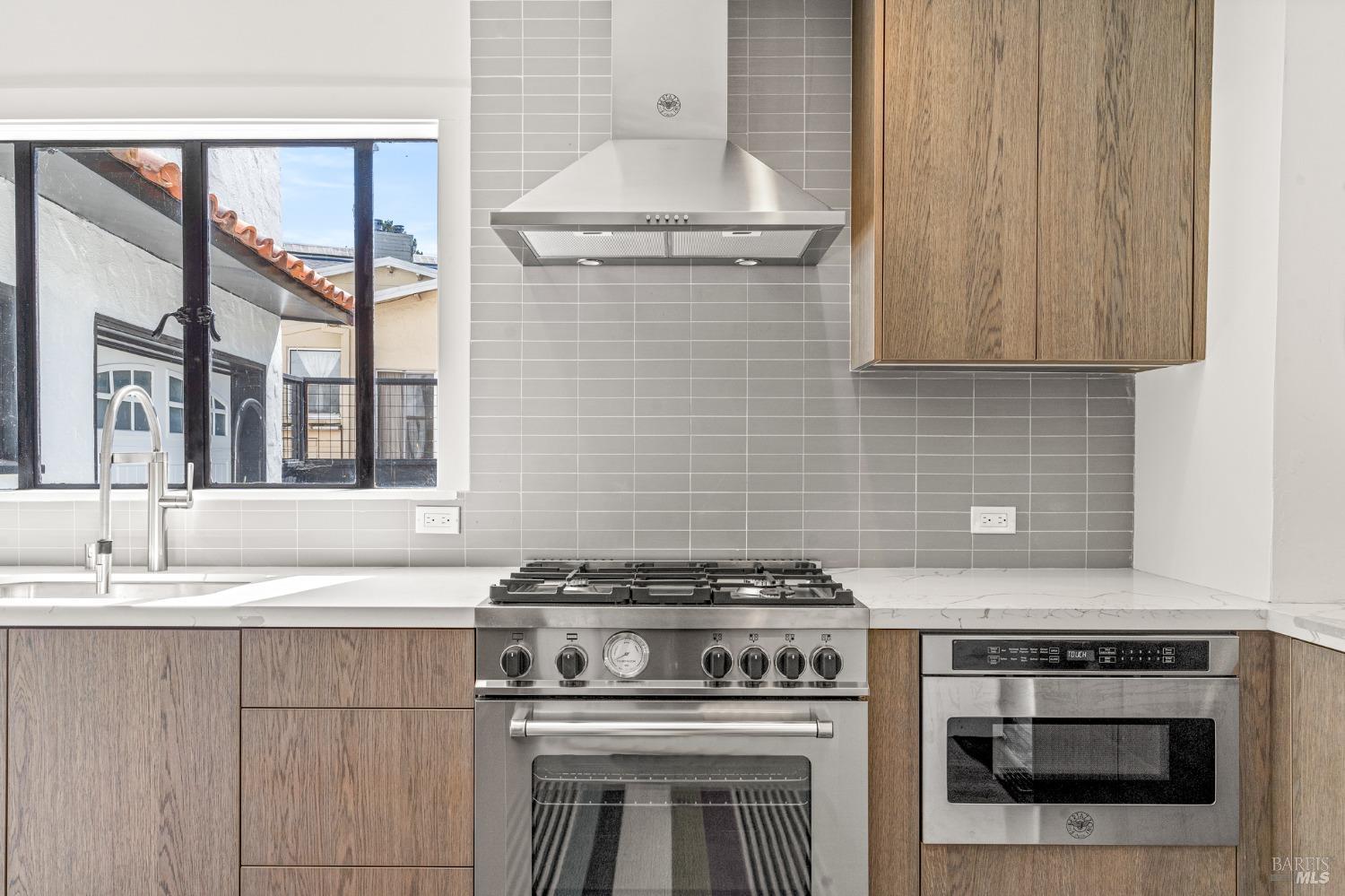 93 Cascade Drive Fairfax, CA 94930 - Photo 31 of 61 a stove top oven sitting inside of a kitchen