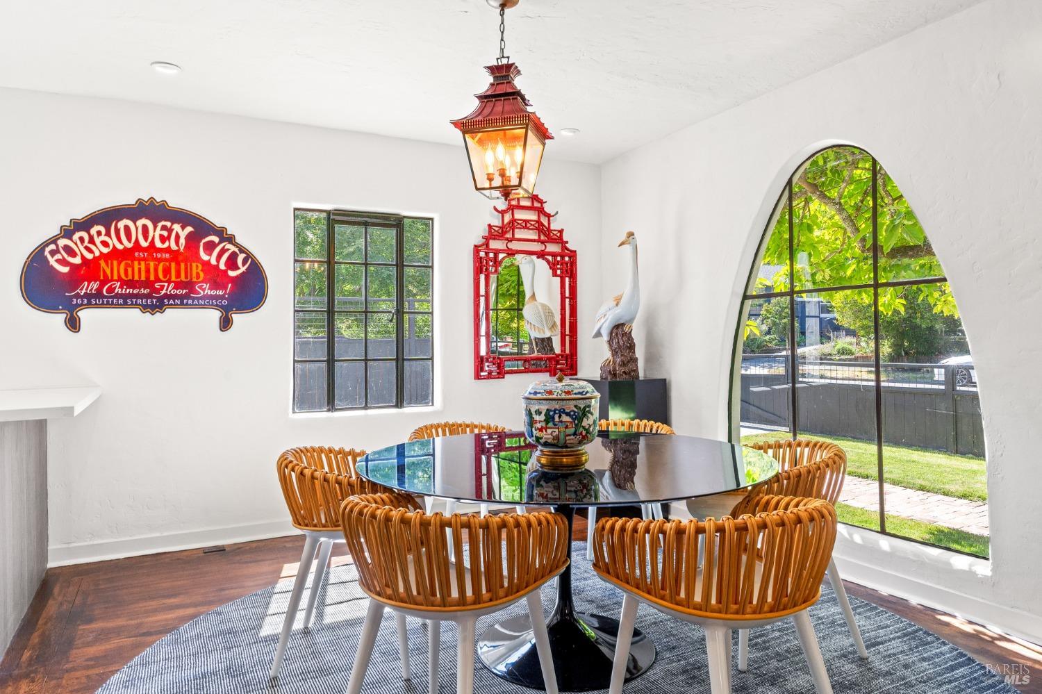 93 Cascade Drive Fairfax, CA 94930 - Photo 37 of 61 a dining room with furniture and a chandelier