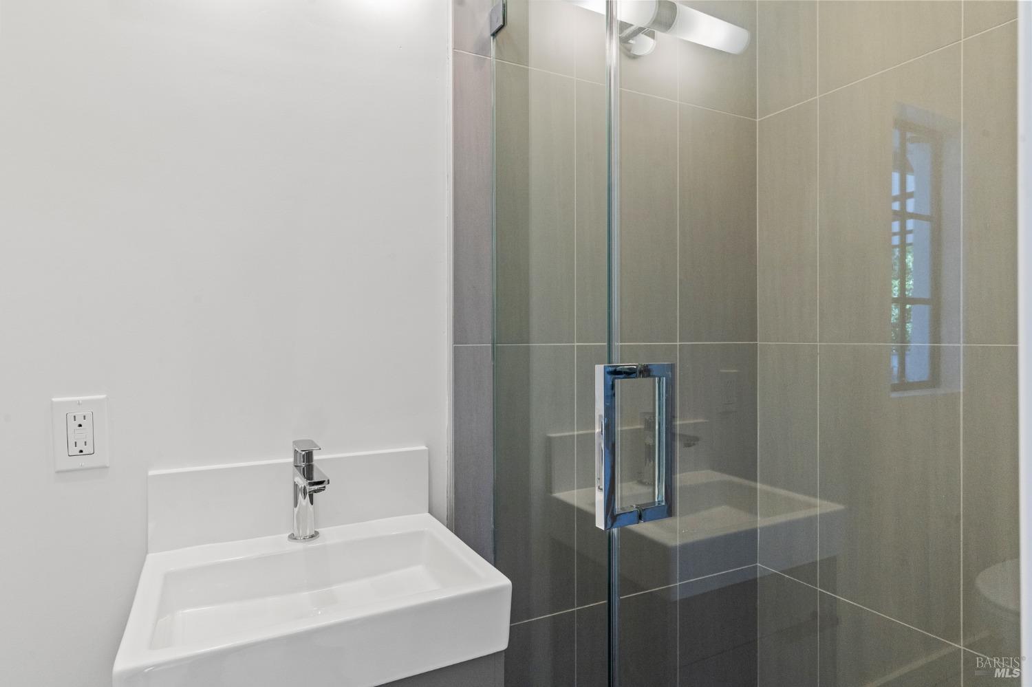 93 Cascade Drive Fairfax, CA 94930 - Photo 38 of 61 a bathroom with a sink and shower