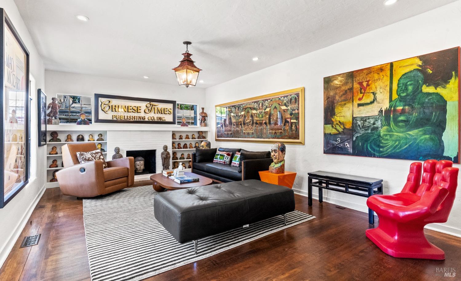 93 Cascade Drive Fairfax, CA 94930 - Photo 6 of 61 a living room with furniture a fireplace and a flat screen tv