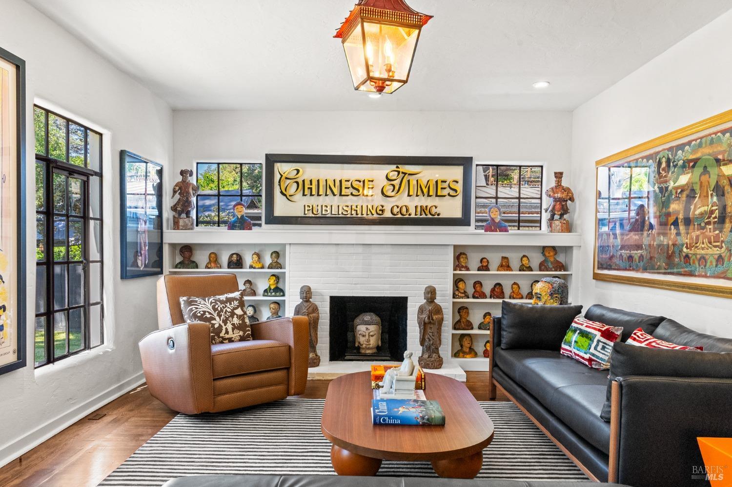 93 Cascade Drive Fairfax, CA 94930 - Photo 9 of 61 a living room with furniture and a fireplace