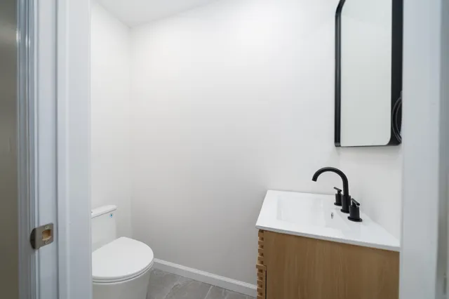 a bathroom with a sink and a toilet