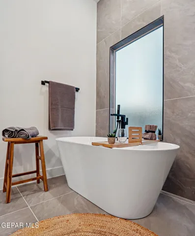 a bedroom with a bed and a closet