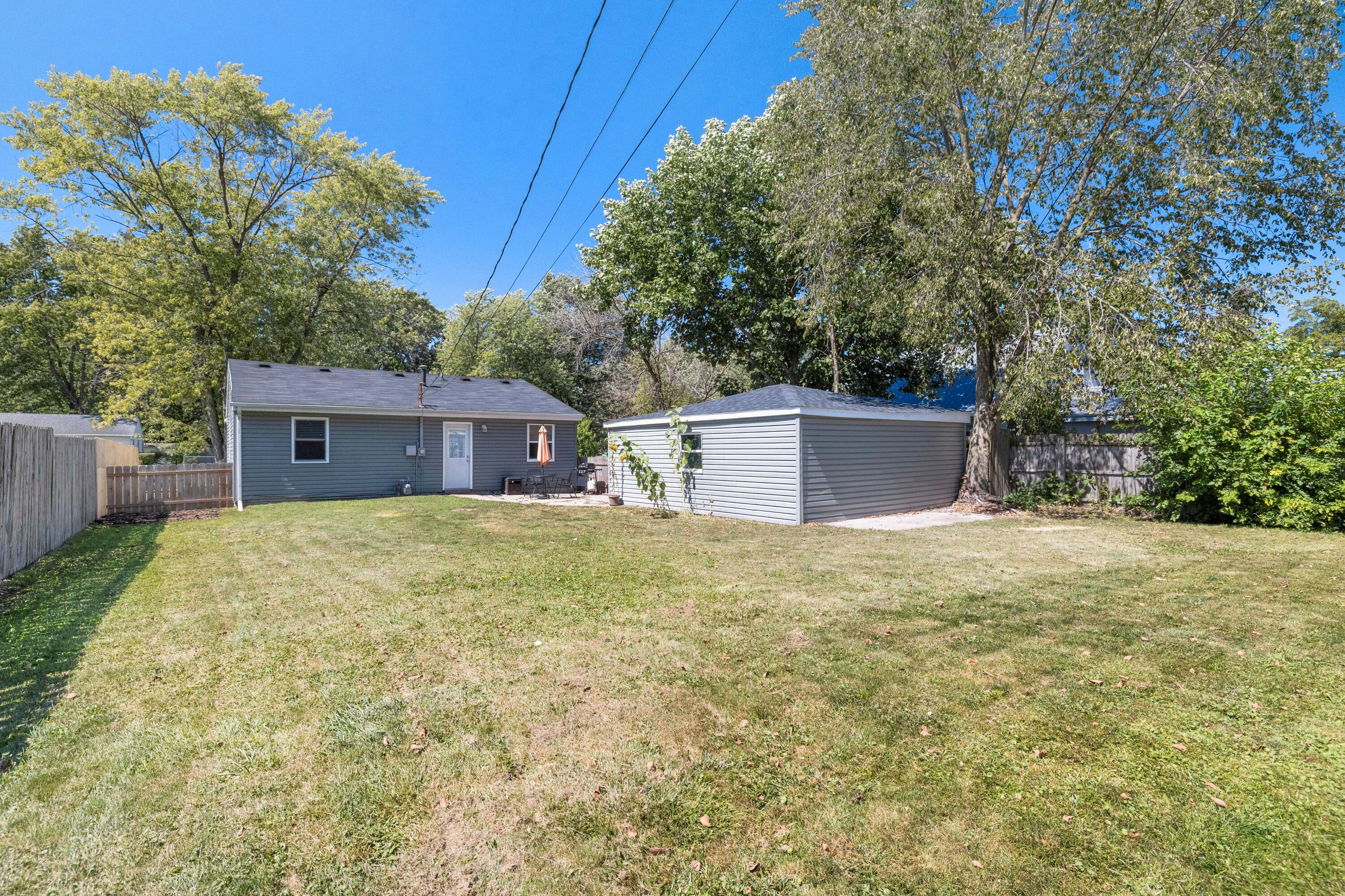 707-1 Imperial Road Valparaiso, IN 46385 - Photo 17 of 17 a view of a house with a yard and a large tree