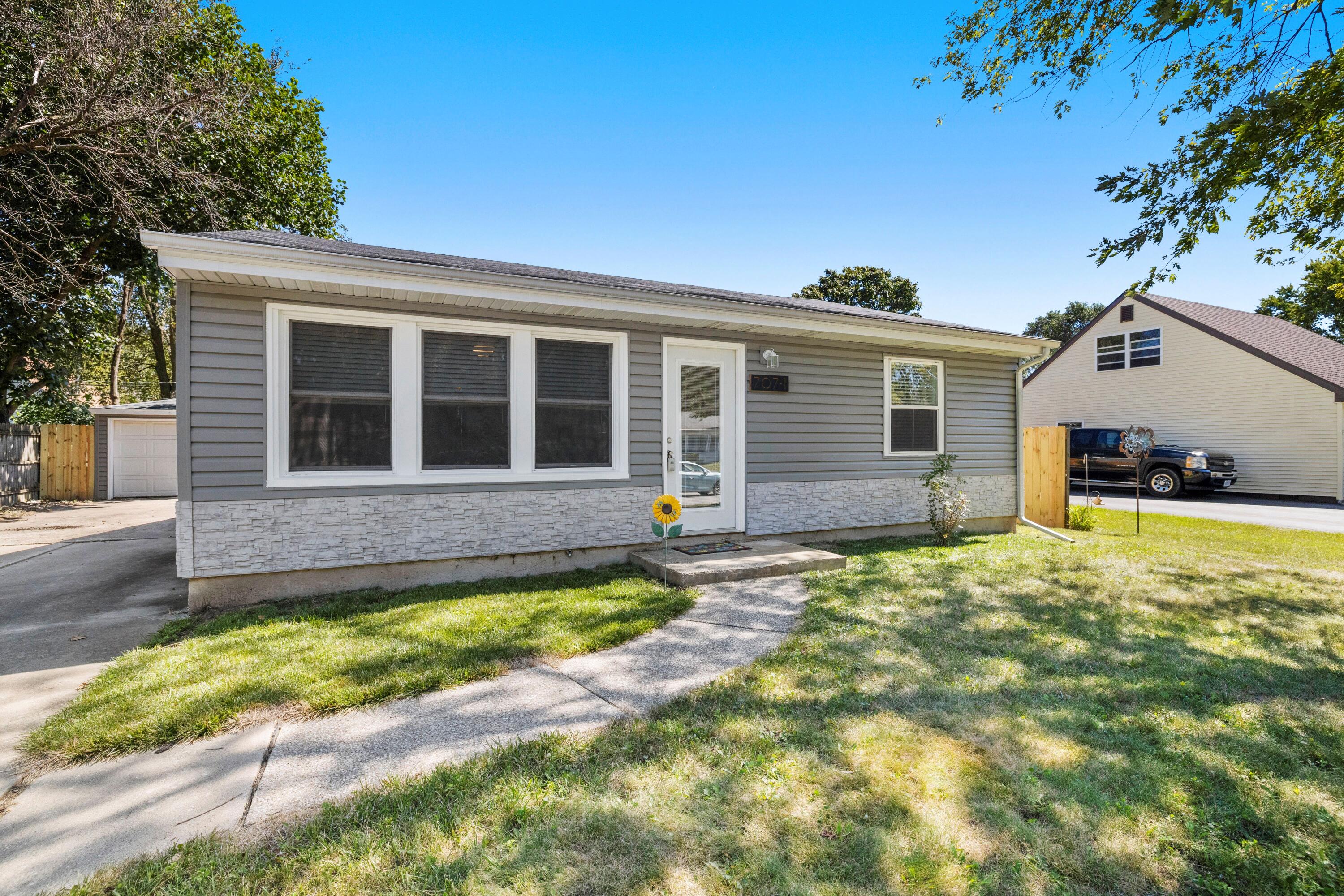 707-1 Imperial Road Valparaiso, IN 46385 - Photo 3 of 17 a front view of a house with a yard