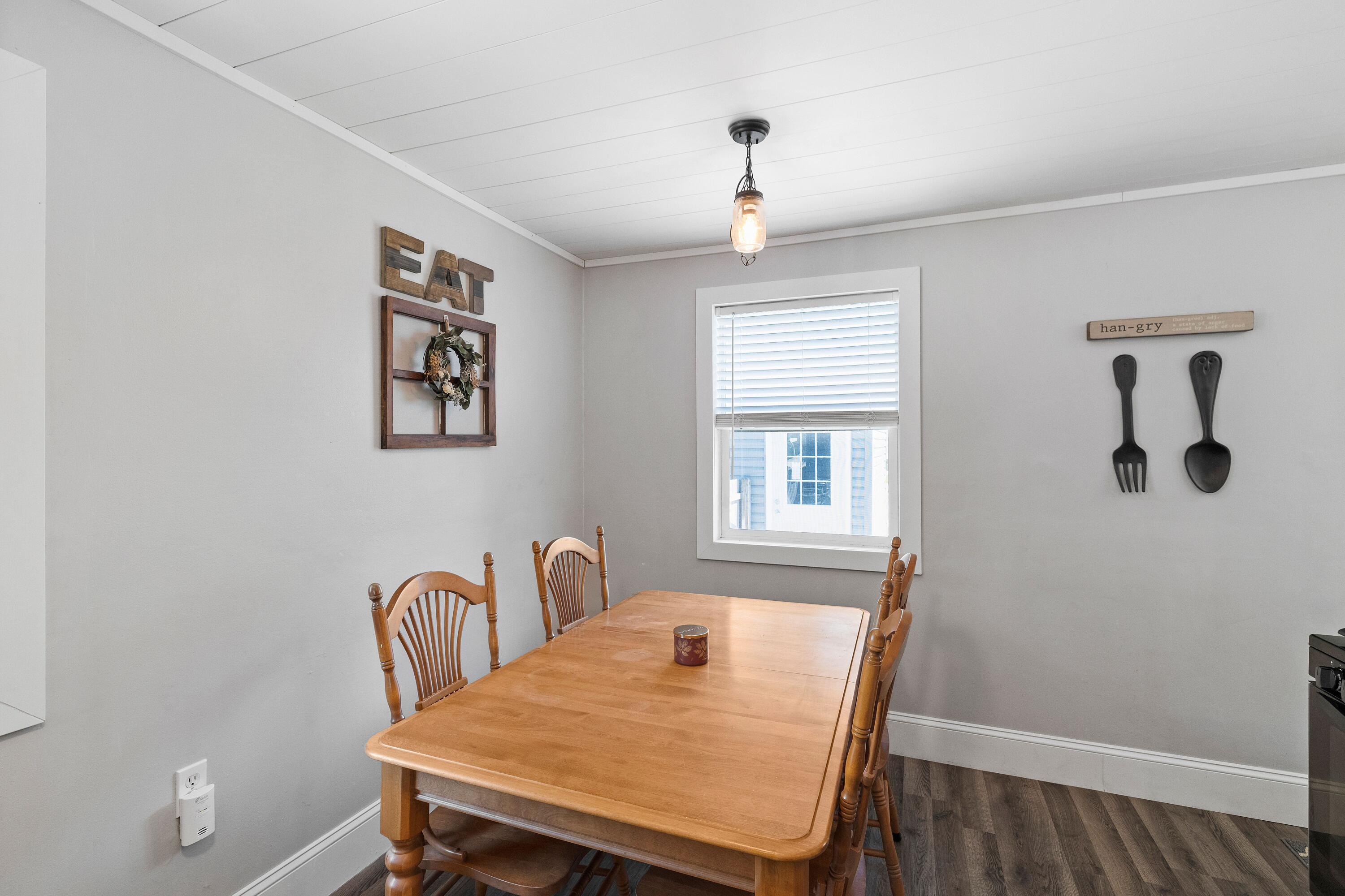 707-1 Imperial Road Valparaiso, IN 46385 - Photo 8 of 17 a view of a dining room with furniture