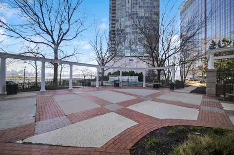 a view of a building with trees