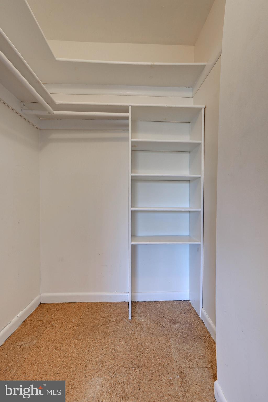 8830 Piney Branch Road, Unit 208 Silver Spring, MD 20903 - Photo 16 of 25 a view of an empty walk in closet