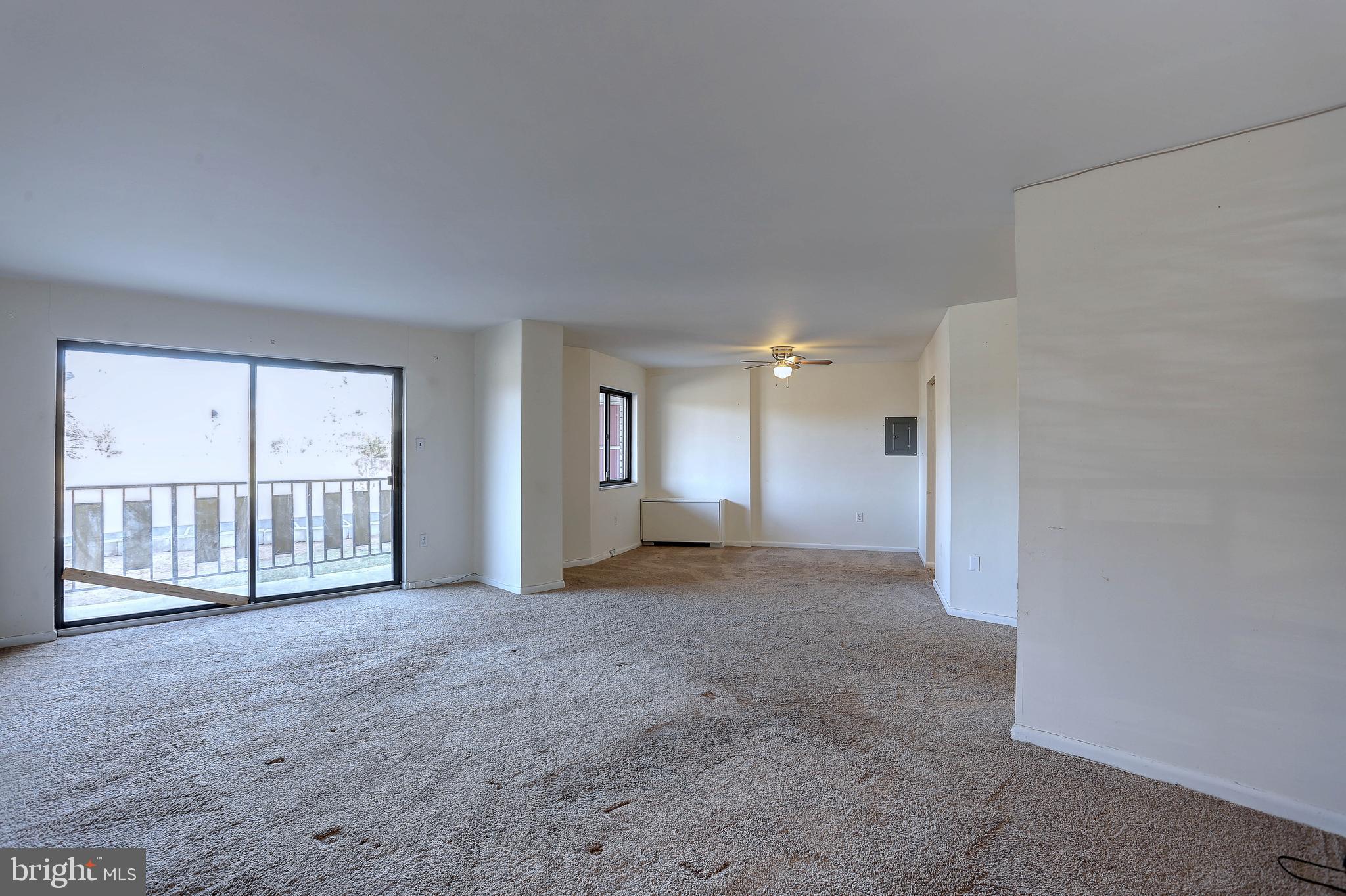 8830 Piney Branch Road, Unit 208 Silver Spring, MD 20903 - Photo 10 of 25 a view of empty room with a fireplace