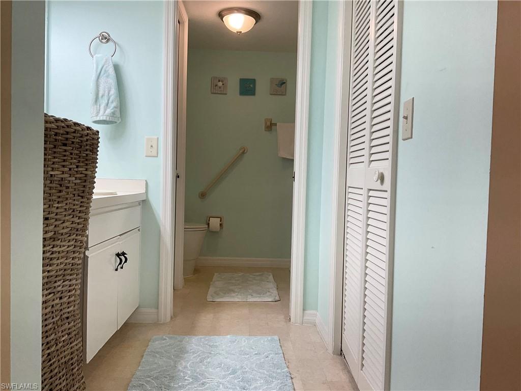 7380 St Ives Way, Unit 1204 Naples, FL 34104 - Photo 18 of 33 a bathroom with a shower