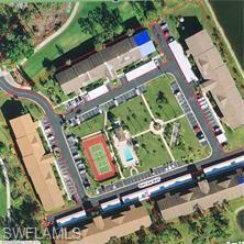 7380 St Ives Way, Unit 1204 Naples, FL 34104 - Photo 28 of 33 an aerial view of a residential houses with outdoor space