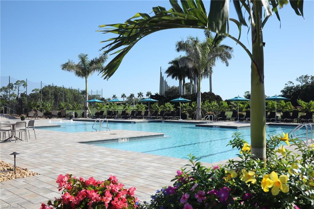 7380 St Ives Way, Unit 1204 Naples, FL 34104 - Photo 30 of 33 a view of a lake with a sitting area