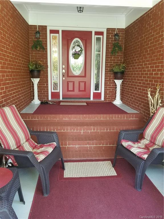 1313 Blacksnake Road Stanley, NC 28164 - Photo 2 of 17 a room with chairs and a table