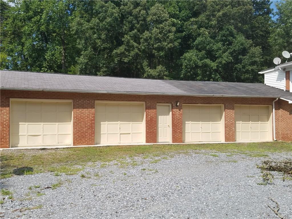 1313 Blacksnake Road Stanley, NC 28164 - Photo 16 of 17 front view of a house and a yard
