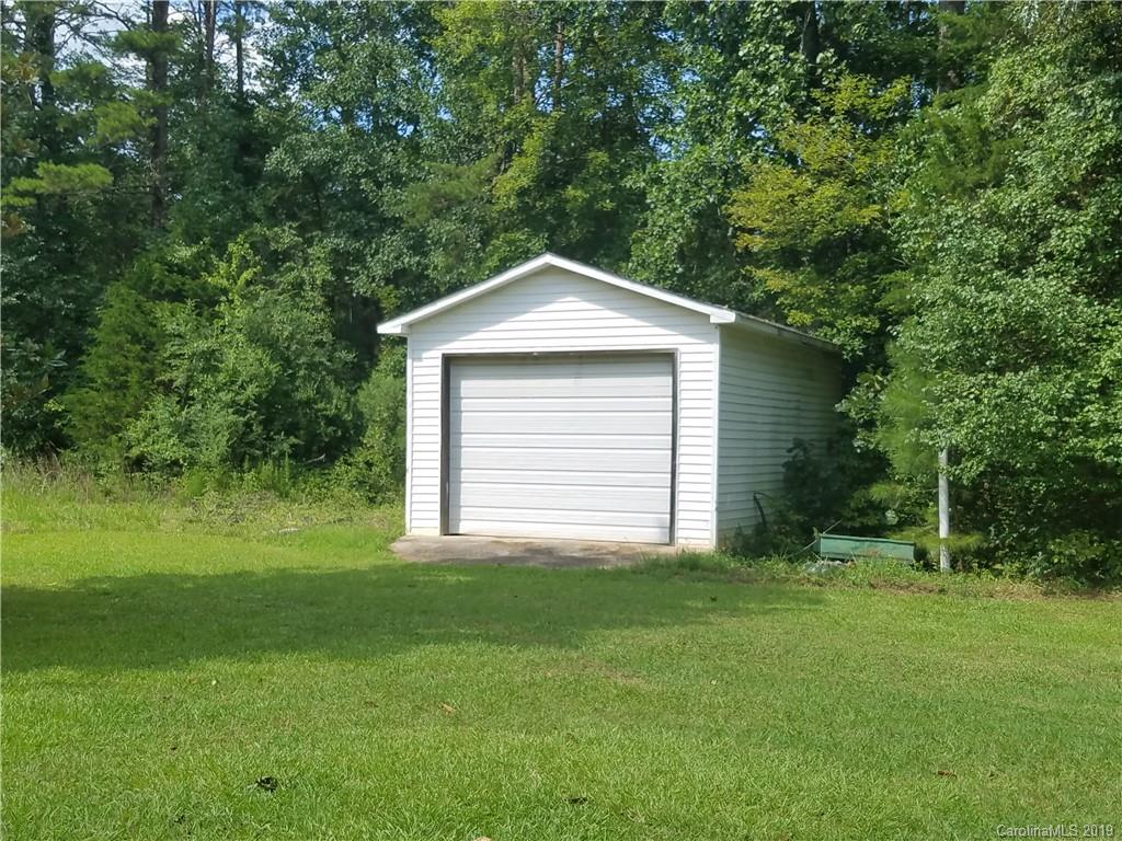 1313 Blacksnake Road Stanley, NC 28164 - Photo 17 of 17 a front view of a house with a yard