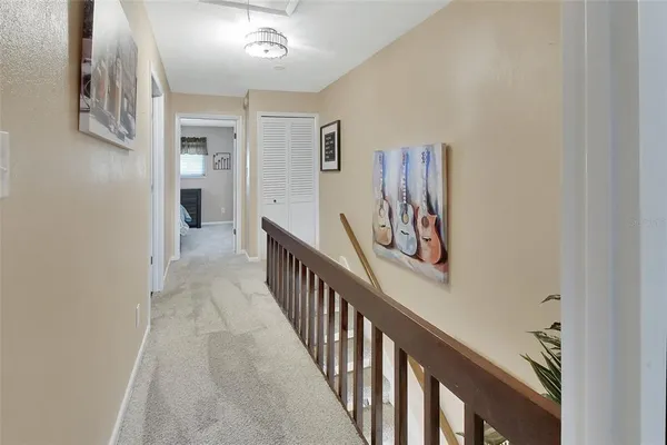 a view of hallway with stairs