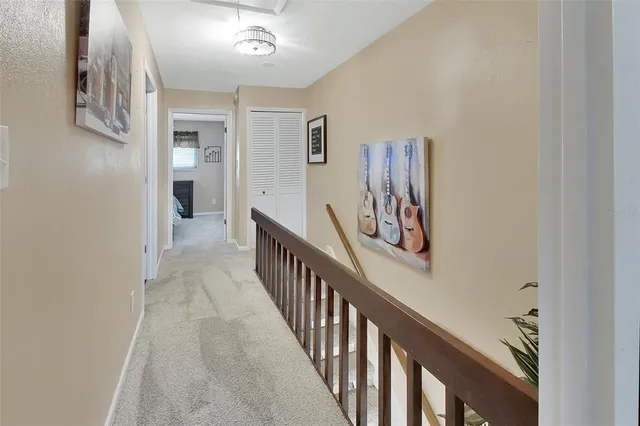 a view of hallway with stairs