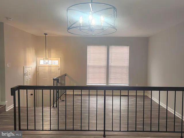 a view of a porch with a chandelier