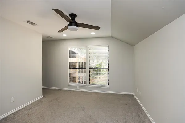 a bathroom with a double vanity sink and mirror