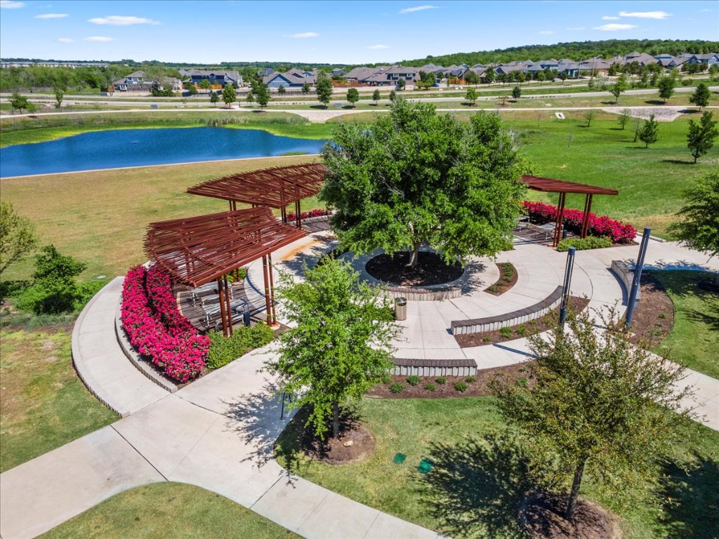 8105 Frida Bend Austin, TX 78744 - Photo 18 of 24 an aerial view of a house with outdoor space and lake view