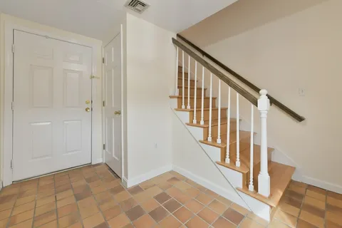 a view of an entryway with staircase