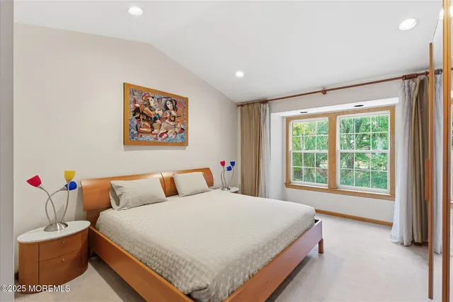 a balcony with furniture and a potted plant