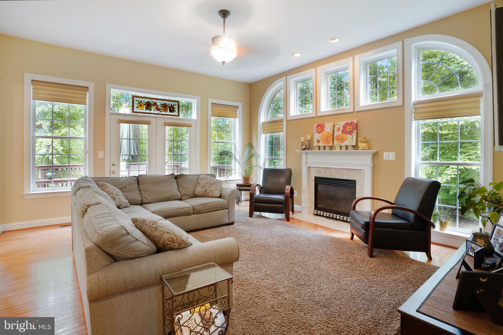 5301 Rutherford Drive Woodbridge, VA 22193 - Photo 16 of 58 Family Room with 10ft Ceiling and Gas Fireplace