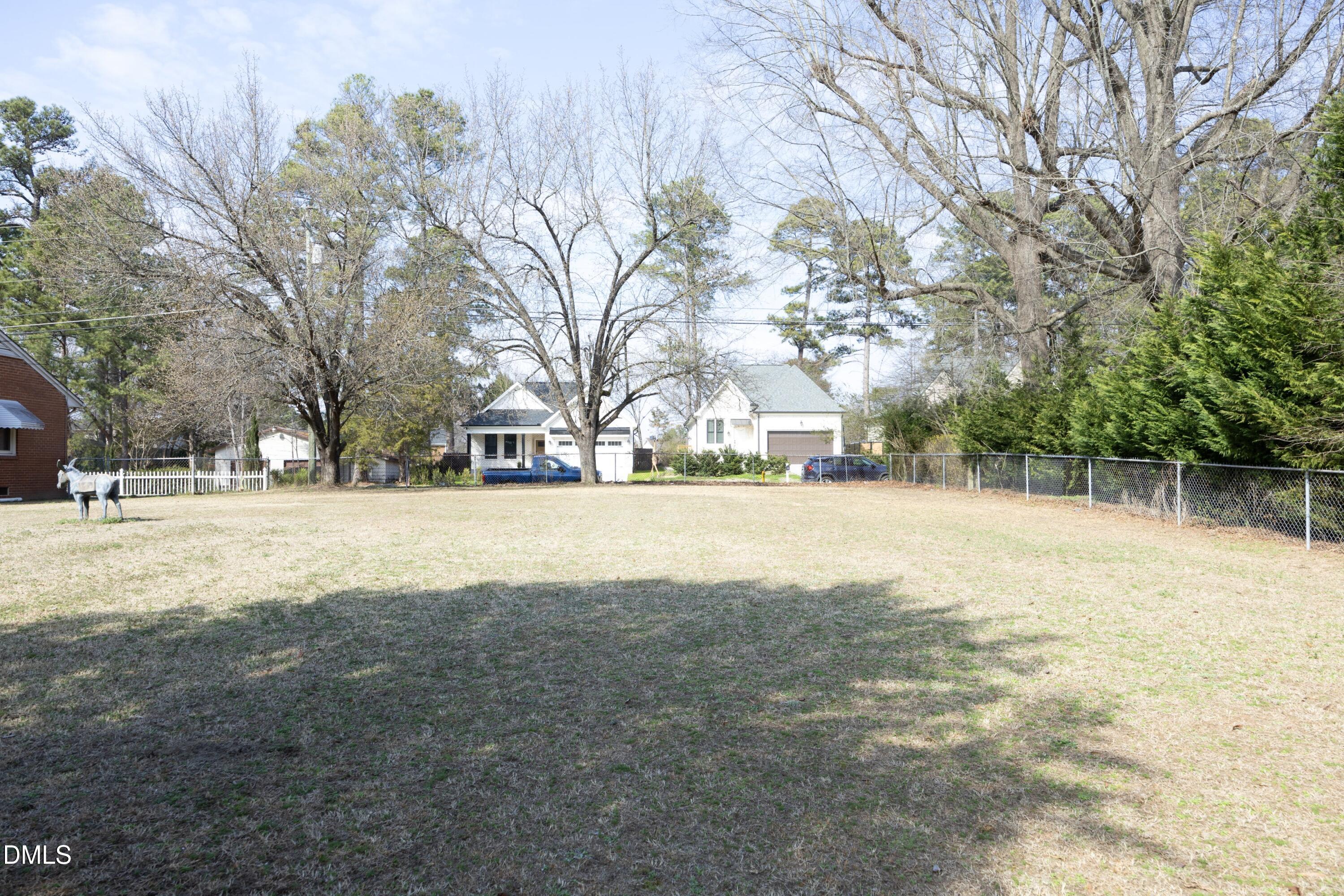 3504 Skycrest Drive Raleigh, NC 27604 - Photo 5 of 10 a view of yard with tree s