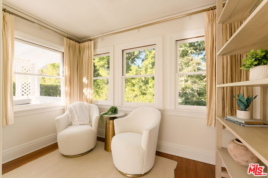 441 South Muirfield Road Los Angeles, CA 90020 - Photo 17 of 33 a living room with furniture and a large window