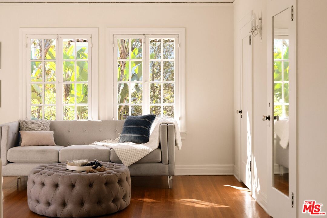 441 South Muirfield Road Los Angeles, CA 90020 - Photo 24 of 33 a living room with furniture and a window