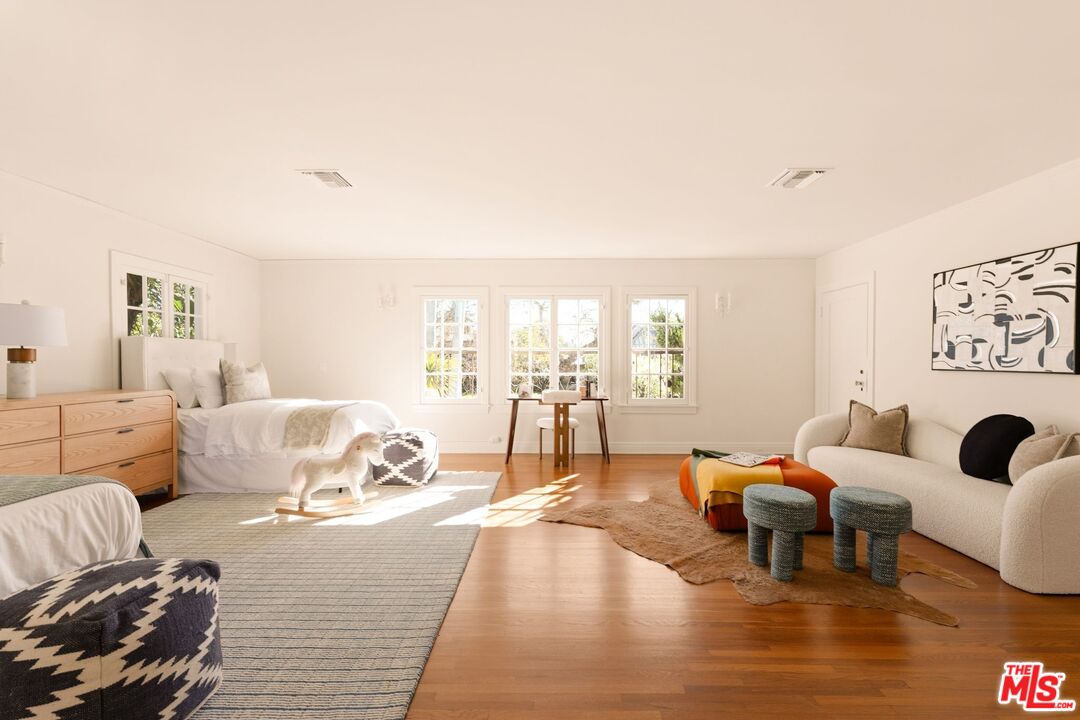 441 South Muirfield Road Los Angeles, CA 90020 - Photo 25 of 33 a living room with furniture and a large window