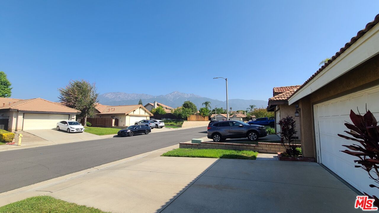 7489 Brookside Road Rancho Cucamonga, CA 91730 - Photo 41 of 41 a view of a house with a swimming pool
