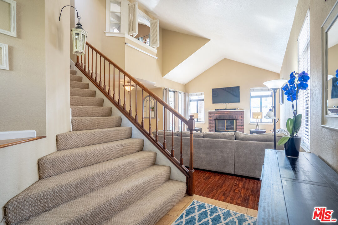 7489 Brookside Road Rancho Cucamonga, CA 91730 - Photo 5 of 41 a living room with furniture and wooden floor