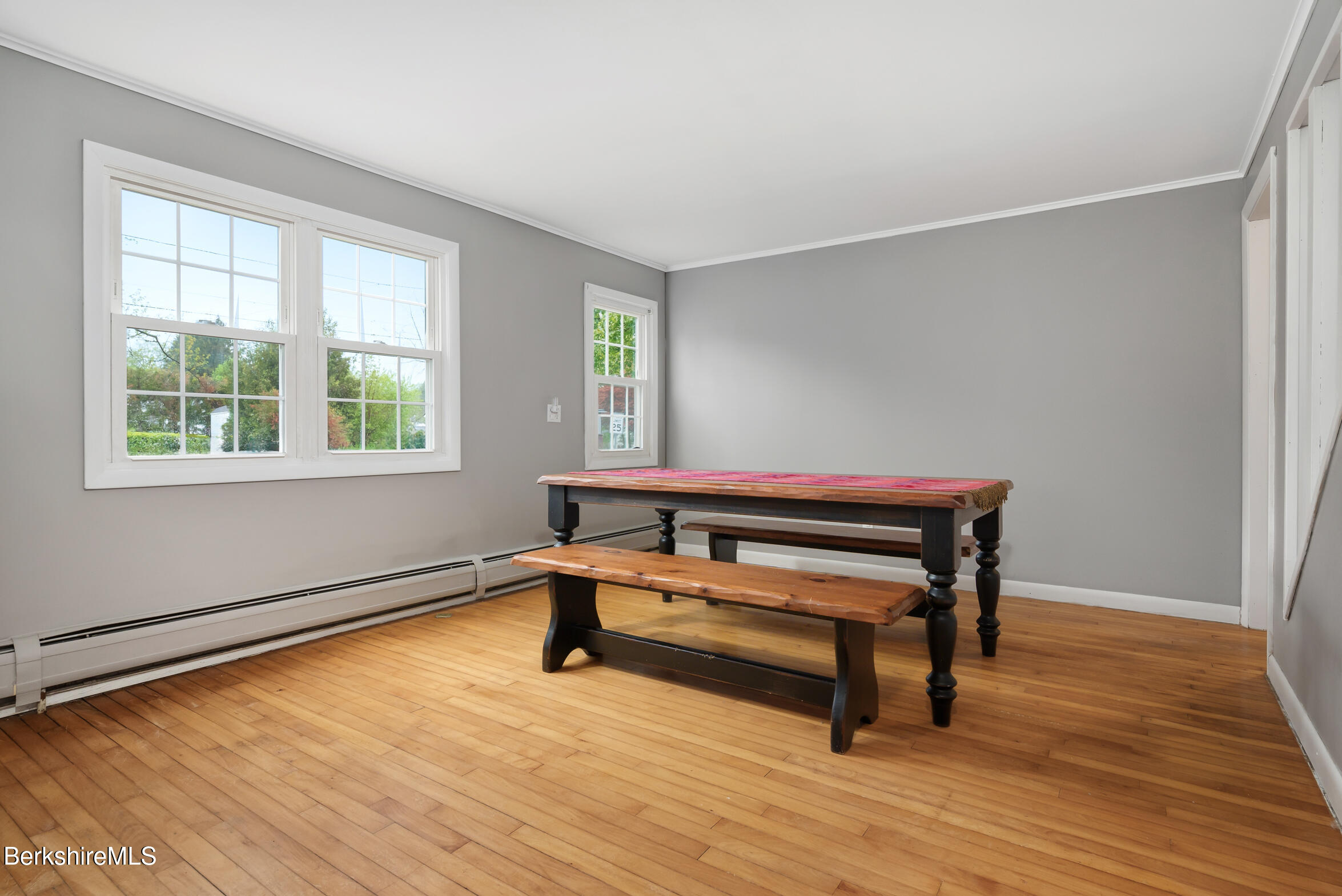 310 Luce Road Williamstown, MA 01267 - Photo 8 of 30 a room with wooden floor and windows