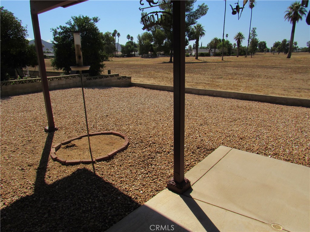 26541 Chambers Avenue Menifee, CA 92586 - Photo 11 of 61 a view of a swimming pool with a patio