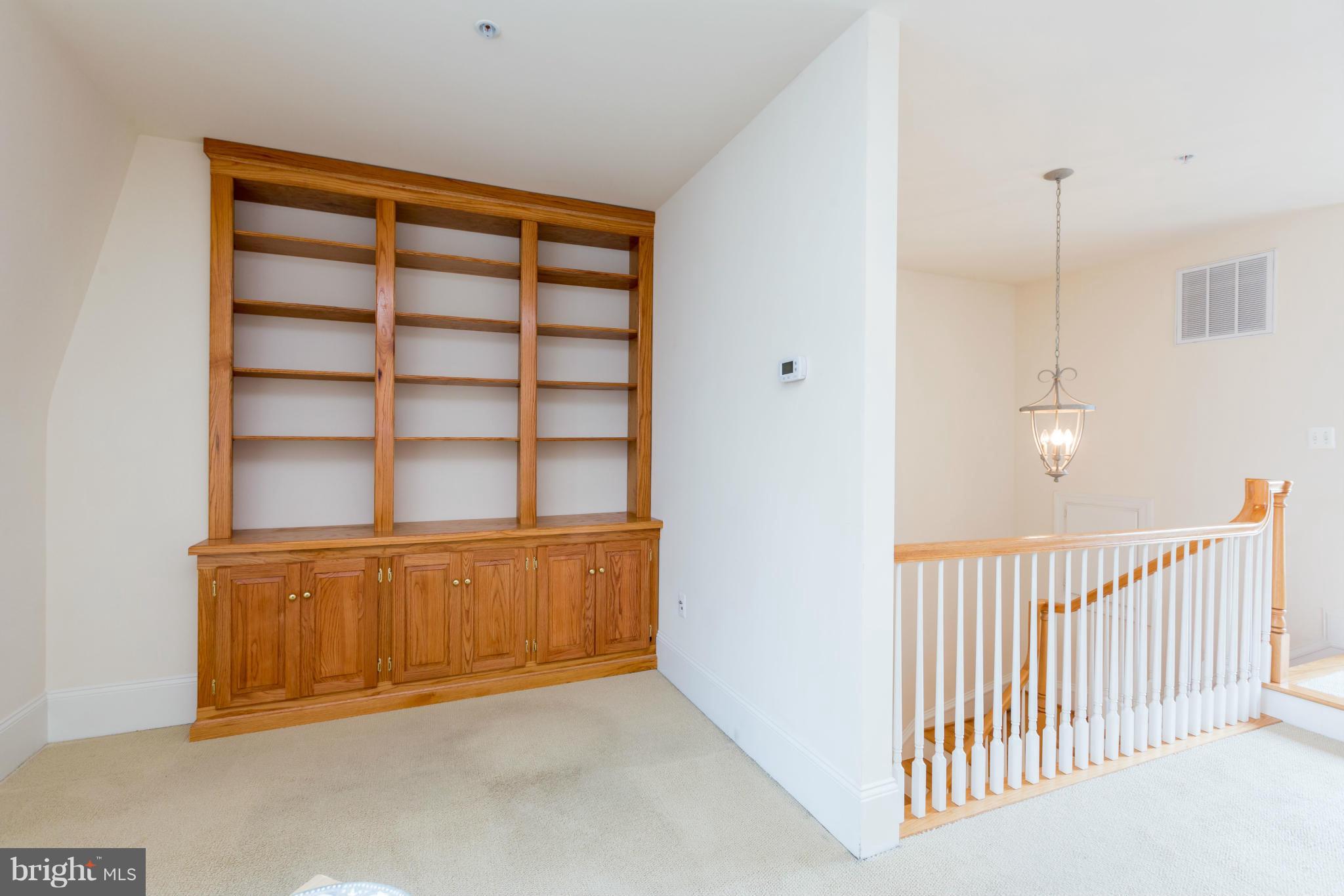718 Carpenter Road Alexandria, VA 22314 - Photo 14 of 26 Custom built-ins in party room