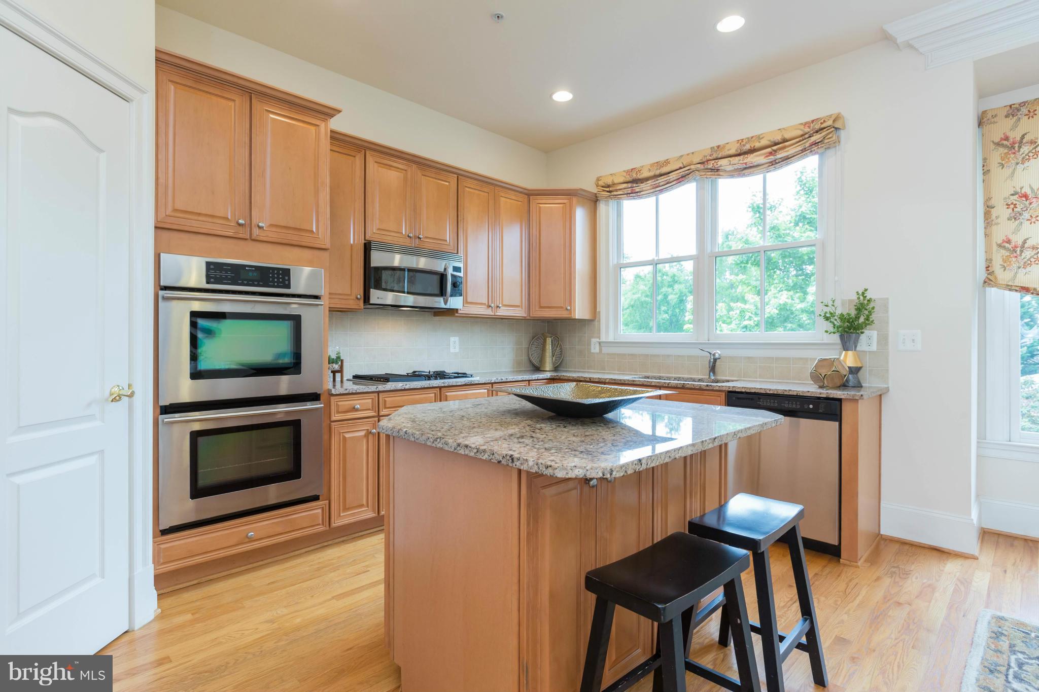 718 Carpenter Road Alexandria, VA 22314 - Photo 6 of 26 Kitchen with views of trees
