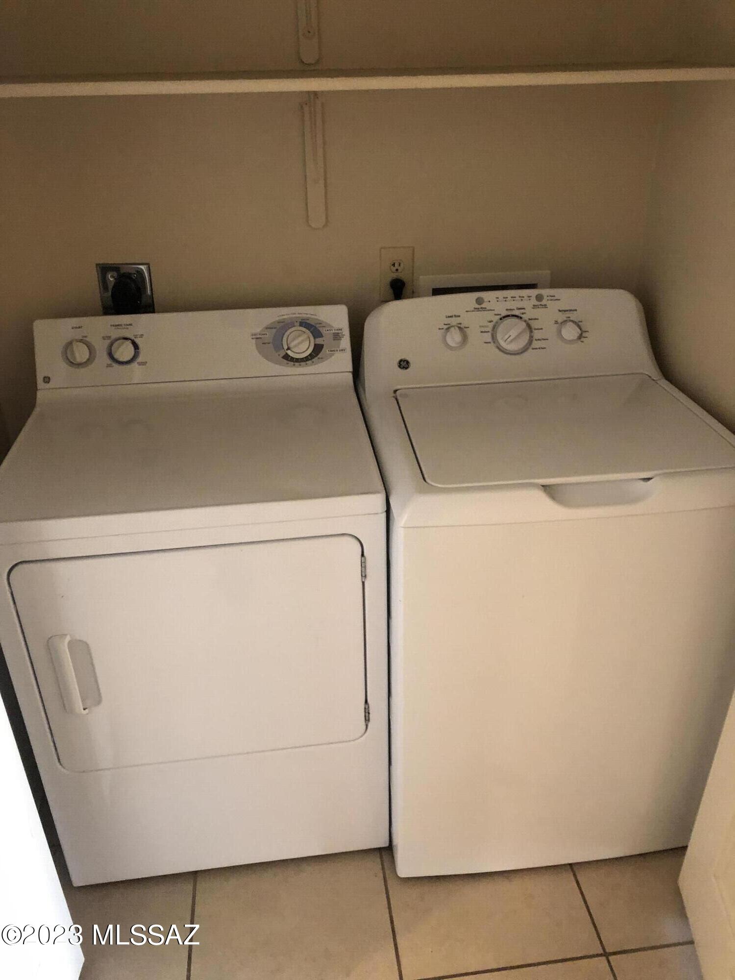 2550 East River Road, Unit 5104 Tucson, AZ 85718 - Photo 14 of 14 a utility room with dryer and washer